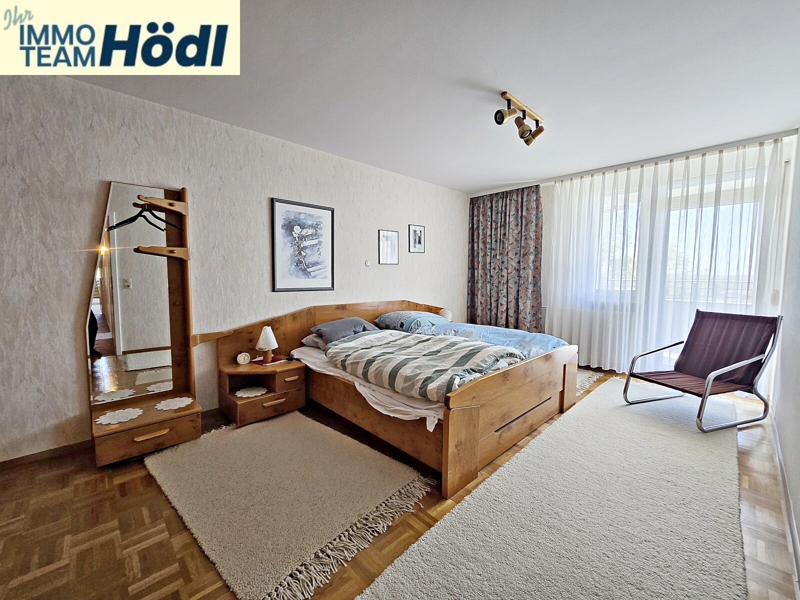 Schlafzimmer mit ZUgang zum Balkon 